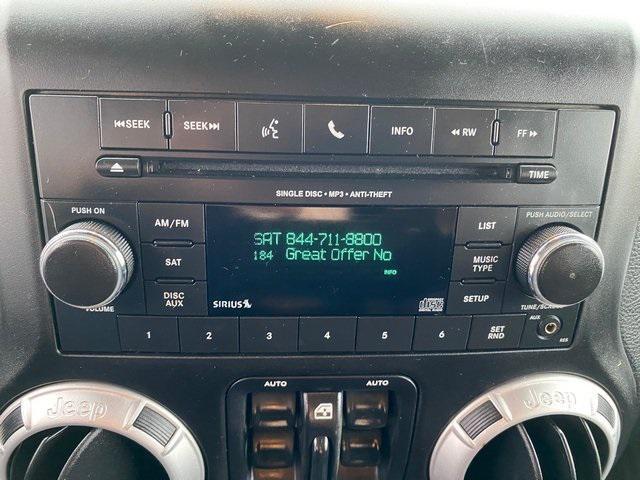 used 2014 Jeep Wrangler Unlimited car, priced at $15,443