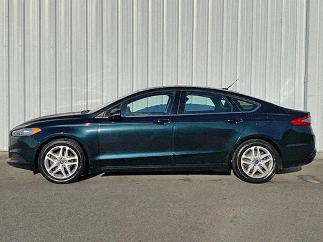 used 2014 Ford Fusion car, priced at $6,997