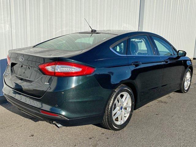 used 2014 Ford Fusion car, priced at $6,997