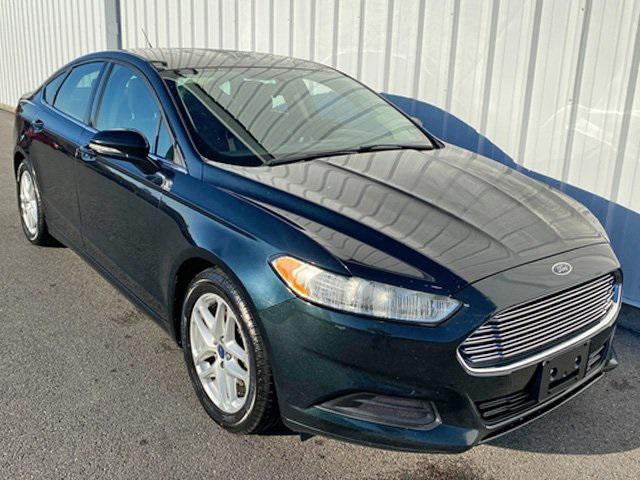 used 2014 Ford Fusion car, priced at $6,997