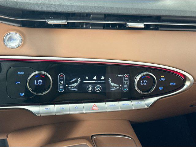 used 2023 Genesis GV70 car, priced at $38,136