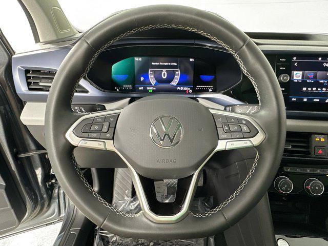 used 2023 Volkswagen Taos car, priced at $22,306