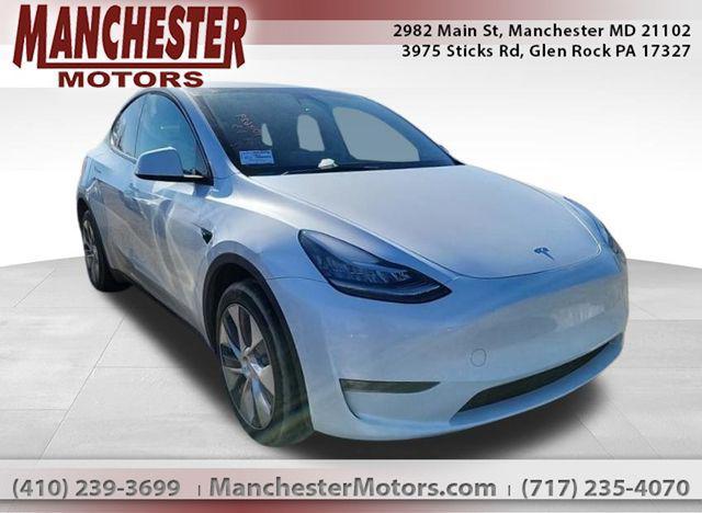 used 2023 Tesla Model Y car, priced at $30,000