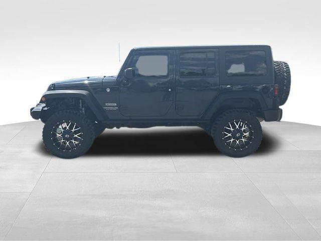 used 2017 Jeep Wrangler Unlimited car, priced at $26,400