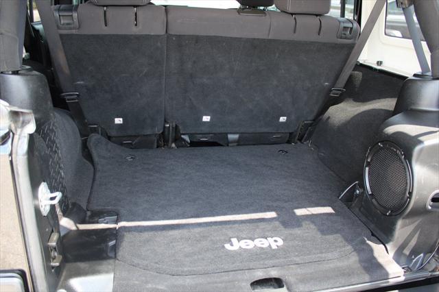 used 2013 Jeep Wrangler Unlimited car, priced at $16,698