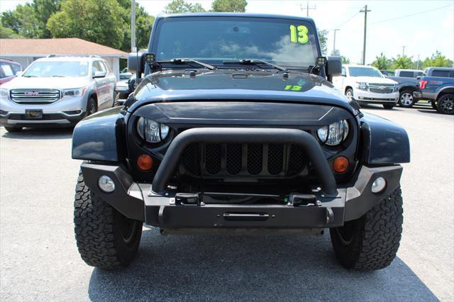 used 2013 Jeep Wrangler Unlimited car, priced at $16,698