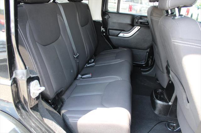 used 2013 Jeep Wrangler Unlimited car, priced at $16,698