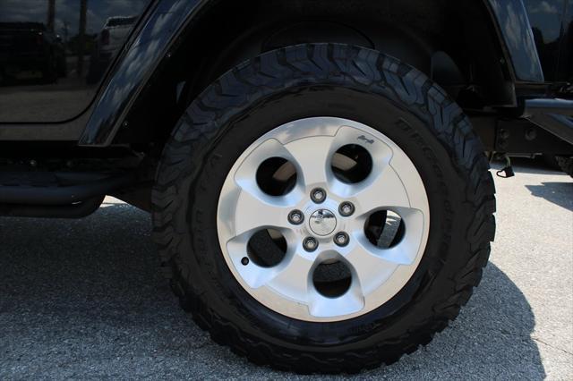 used 2013 Jeep Wrangler Unlimited car, priced at $16,698
