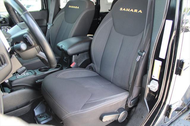 used 2013 Jeep Wrangler Unlimited car, priced at $16,698