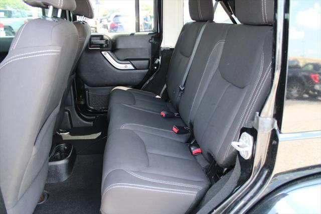 used 2013 Jeep Wrangler Unlimited car, priced at $16,698