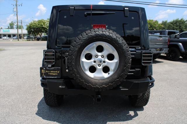 used 2013 Jeep Wrangler Unlimited car, priced at $16,698
