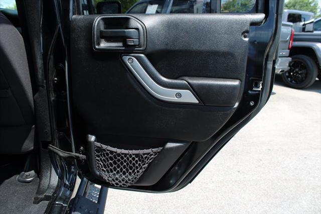 used 2013 Jeep Wrangler Unlimited car, priced at $16,698