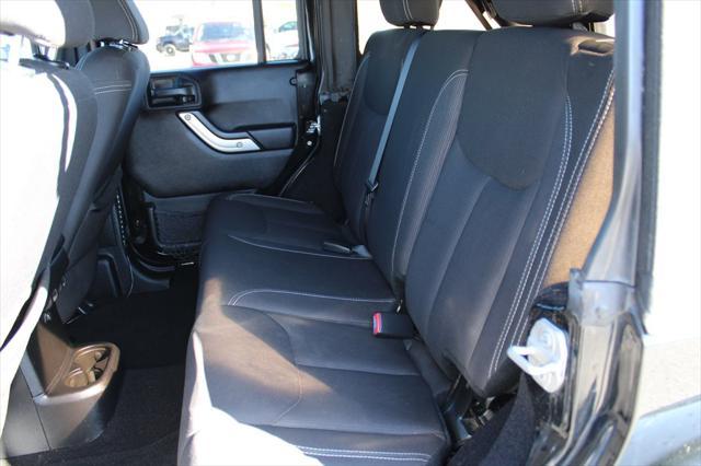 used 2015 Jeep Wrangler Unlimited car, priced at $18,664