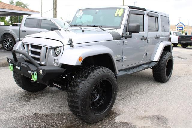 used 2014 Jeep Wrangler Unlimited car, priced at $19,995