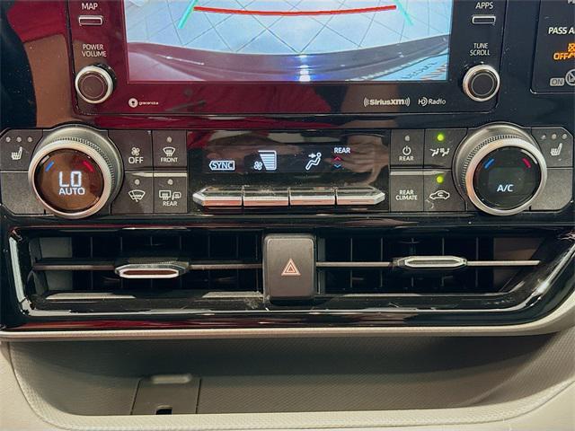 used 2020 Toyota Highlander Hybrid car, priced at $30,178
