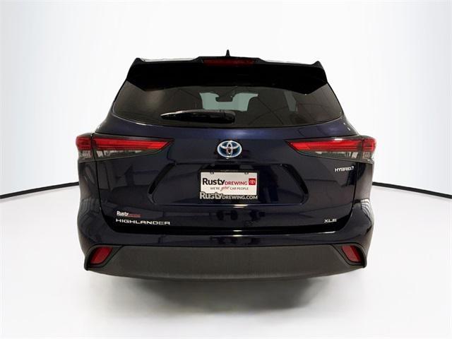 used 2020 Toyota Highlander Hybrid car, priced at $30,178