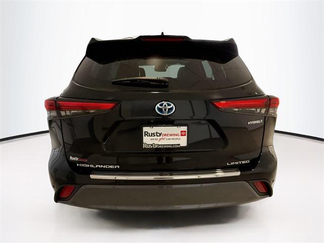 used 2021 Toyota Highlander Hybrid car, priced at $28,734