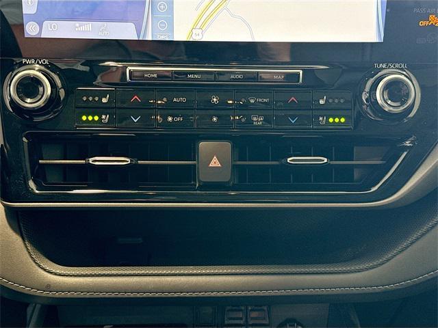 used 2021 Toyota Highlander Hybrid car, priced at $28,734