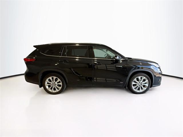 used 2021 Toyota Highlander Hybrid car, priced at $28,734