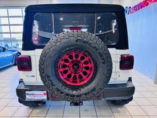 used 2021 Jeep Wrangler Unlimited car, priced at $38,225