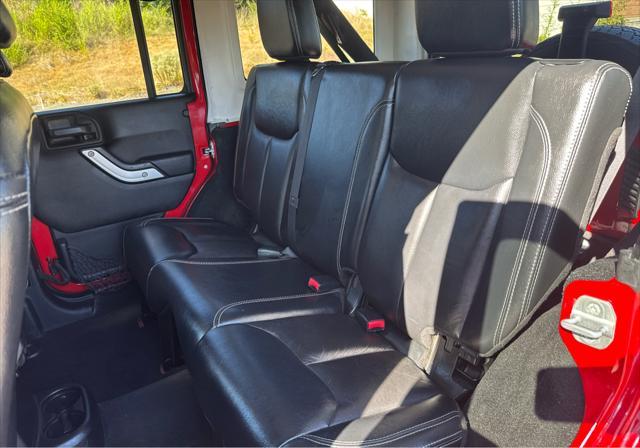 used 2014 Jeep Wrangler Unlimited car, priced at $17,795