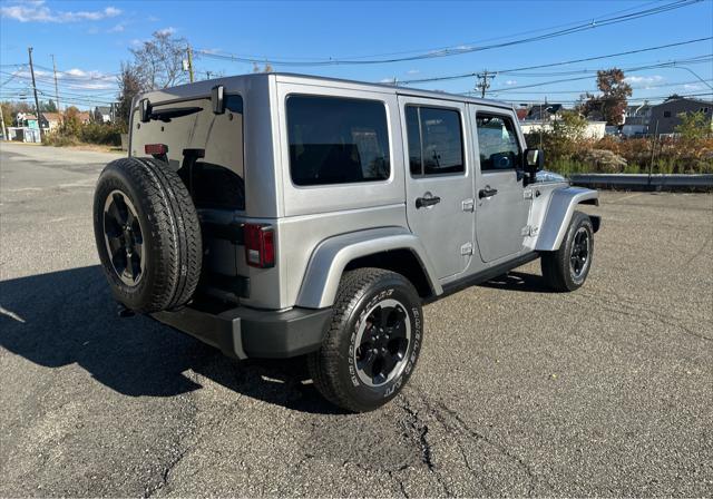 used 2014 Jeep Wrangler Unlimited car, priced at $21,995