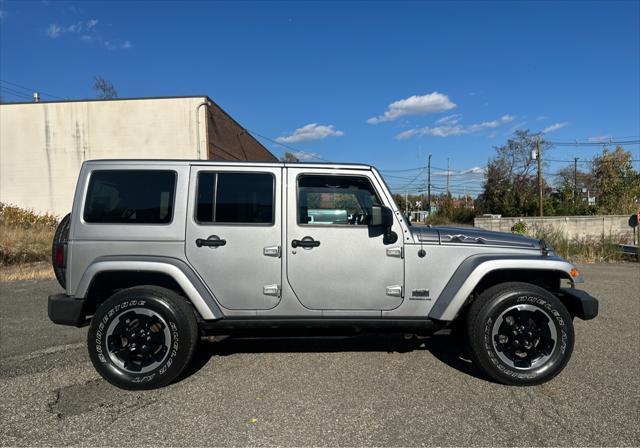 used 2014 Jeep Wrangler Unlimited car, priced at $21,995