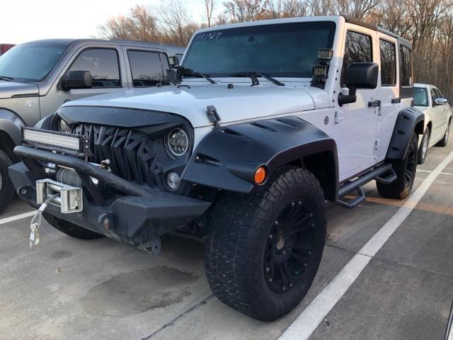 used 2015 Jeep Wrangler Unlimited car, priced at $20,140