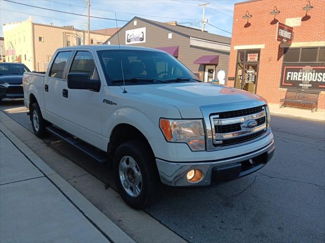 used 2013 Ford F-150 car, priced at $15,000