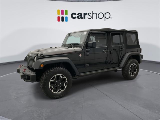 used 2015 Jeep Wrangler Unlimited car, priced at $20,547