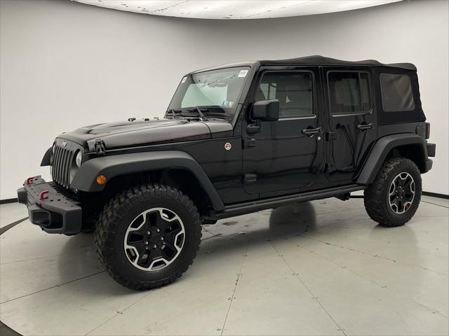 used 2015 Jeep Wrangler Unlimited car, priced at $22,048