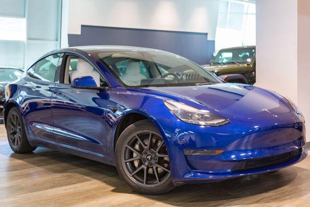 used 2023 Tesla Model 3 car, priced at $31,995