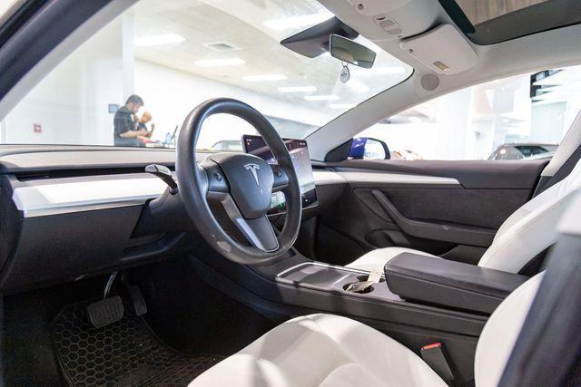 used 2023 Tesla Model 3 car, priced at $31,995