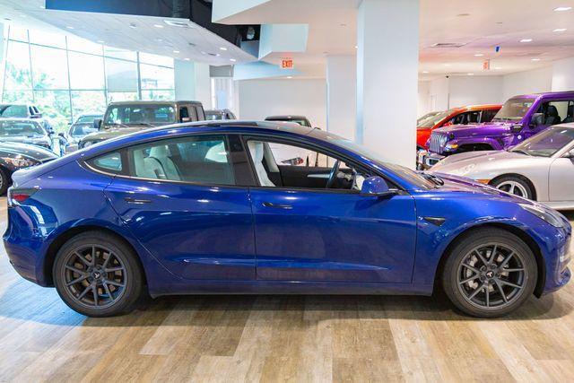 used 2023 Tesla Model 3 car, priced at $31,995