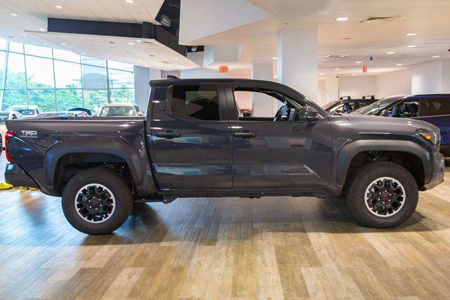 used 2024 Toyota Tacoma car, priced at $49,995
