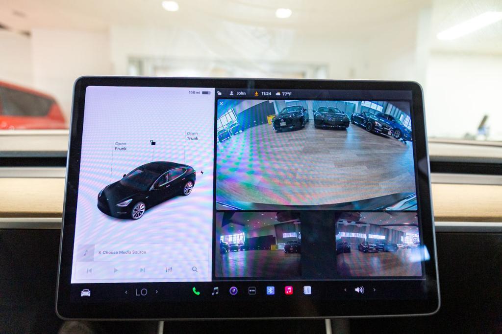 used 2018 Tesla Model 3 car, priced at $22,995