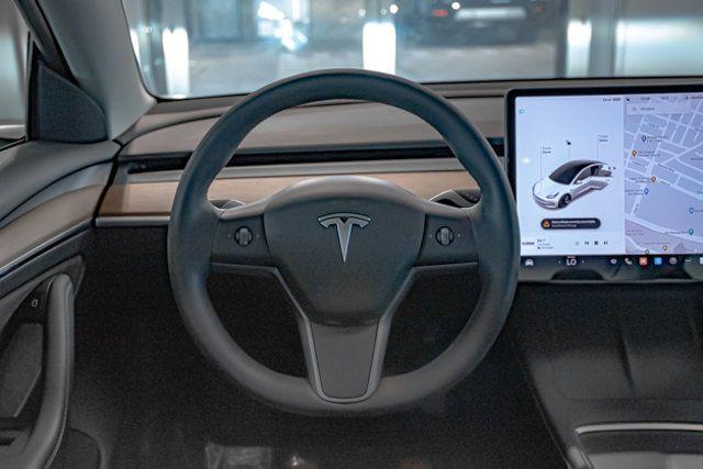 used 2022 Tesla Model 3 car, priced at $34,995