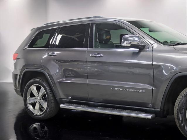 used 2014 Jeep Grand Cherokee car, priced at $12,749