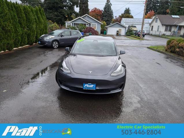 used 2022 Tesla Model 3 car, priced at $32,377