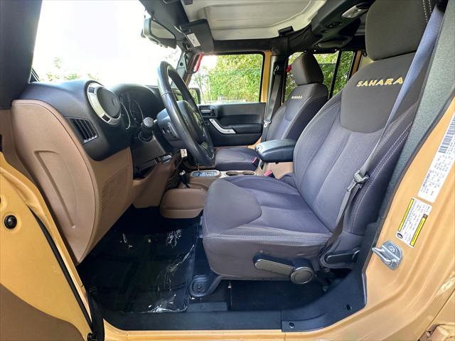 used 2014 Jeep Wrangler Unlimited car, priced at $21,900