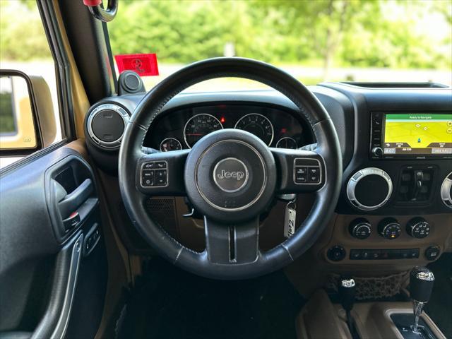 used 2014 Jeep Wrangler Unlimited car, priced at $21,900