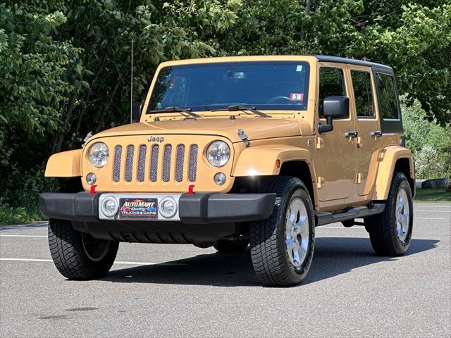 used 2014 Jeep Wrangler Unlimited car, priced at $21,900