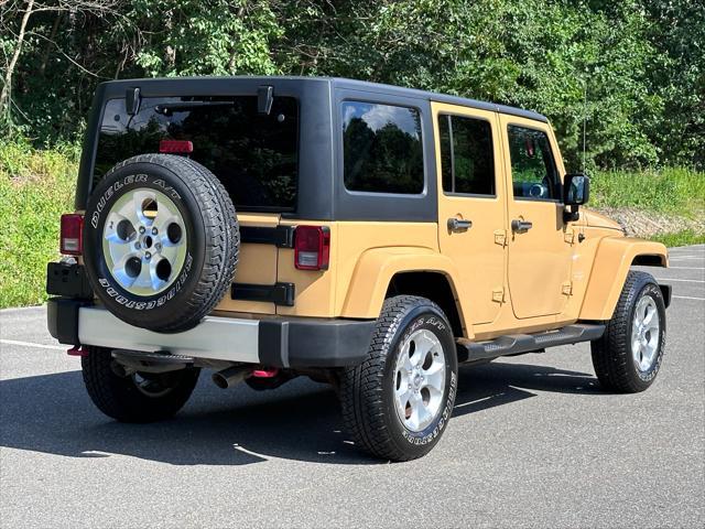 used 2014 Jeep Wrangler Unlimited car, priced at $21,900