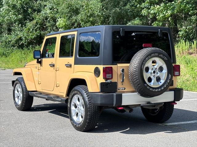 used 2014 Jeep Wrangler Unlimited car, priced at $21,900