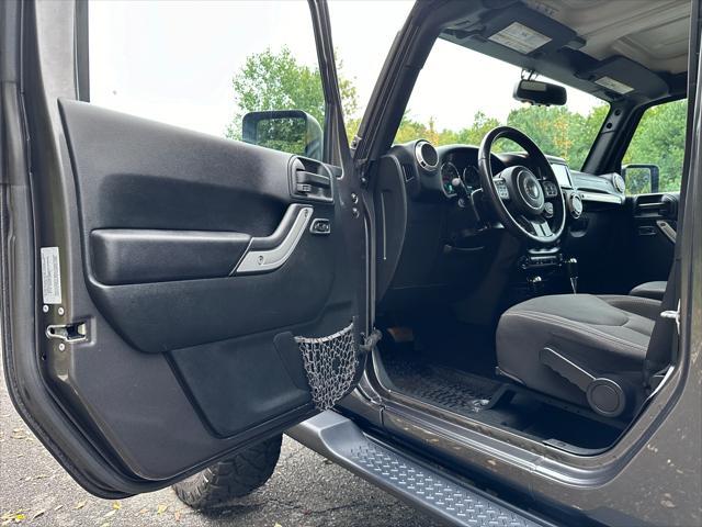 used 2017 Jeep Wrangler Unlimited car, priced at $31,900