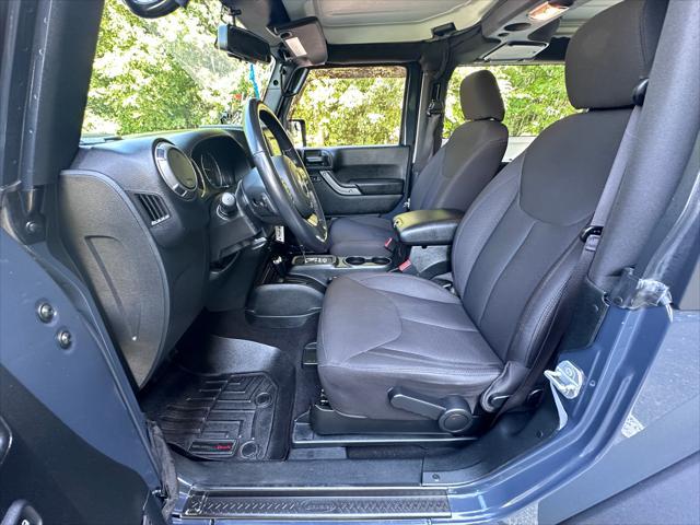 used 2018 Jeep Wrangler JK car, priced at $23,900