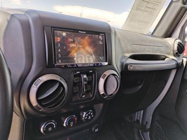 used 2015 Jeep Wrangler Unlimited car, priced at $18,329