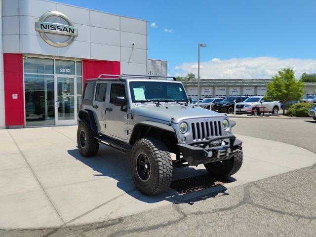 used 2015 Jeep Wrangler Unlimited car, priced at $18,329