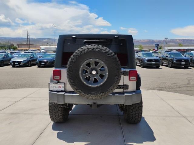 used 2015 Jeep Wrangler Unlimited car, priced at $18,329