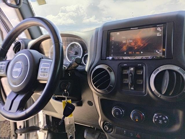 used 2015 Jeep Wrangler Unlimited car, priced at $18,329